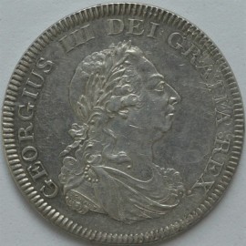 CROWNS 1804  GEORGE III BANK OF ENGLAND DOLLAR WITH TRACES OF HOST COIN VISIBLE  EF