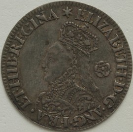 ELIZABETH I 1562  ELIZABETH I SIXPENCE. MILLED COINAGE. TALL BUST DECORATED DRESS. SMALL ROSE. REVERSE. CROSS FOURCHEE. MM STAR.  GVF